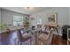 Bright dining area with hardwood floors and a modern table setting for comfortable meals at 1920 W Forrest Ave, Atlanta, GA 30344