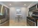 Modern kitchen featuring stainless appliances and breakfast nook at 1920 W Forrest Ave, Atlanta, GA 30344