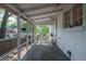 Enclosed patio with tiled floor, white trim, and outdoor seating, great for relaxing and entertaining at 1920 W Forrest Ave, Atlanta, GA 30344
