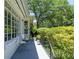 Inviting covered porch with seating, perfect for enjoying the outdoor scenery at 1920 W Forrest Ave, Atlanta, GA 30344