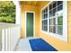 Outdoor patio area provides a private space with trees, railing, and room for seating at 225 Bentley Pl, Tucker, GA 30084