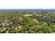 A densely-wooded residential neighborhood is the setting for this single-Gathering home at 2683 Fleur De Lis Pl, Atlanta, GA 30360
