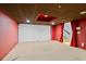A spacious basement is ready for finishing, features modern recessed lighting, and colorful walls at 2683 Fleur De Lis Pl, Atlanta, GA 30360