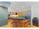 Updated kitchen offers bar seating, stainless-steel appliances, and modern cabinetry at 2683 Fleur De Lis Pl, Atlanta, GA 30360