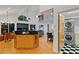 Open concept living space featuring an island, a fireplace, and a laundry room at 2683 Fleur De Lis Pl, Atlanta, GA 30360