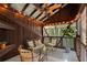 An outdoor porch area creates an idyllic setting to relax and enjoy nature at 2683 Fleur De Lis Pl, Atlanta, GA 30360