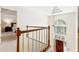 Bright foyer featuring a high ceiling, decorative lighting, and beautiful architectural details at 8920 Willowbrae Ln, Roswell, GA 30076