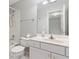 Clean bathroom with a shower/tub combo, updated fixtures, and a spacious vanity at 915 Summer Wind Pl, Roswell, GA 30075