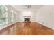 Elegant living room with hardwood floors and fireplace at 915 Summer Wind Pl, Roswell, GA 30075