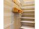 Walk-in pantry with metal racks and wooden shelves at 915 Summer Wind Pl, Roswell, GA 30075