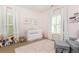 Charming Bedroom featuring carpet floors and white walls at 3110 Dickson Ne St, Brookhaven, GA 30319