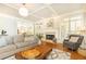 Cozy living room with hardwood floors, a fireplace, and comfortable seating at 3110 Dickson Ne St, Brookhaven, GA 30319