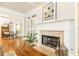 Fireplace with white mantle and hardwood floors in a traditionally styled home at 3110 Dickson Ne St, Brookhaven, GA 30319