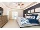 Spacious main bedroom featuring tray ceilings, carpeted floors and ensuite bathroom and walk-in closet at 3110 Dickson Ne St, Brookhaven, GA 30319