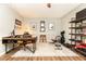Functional office featuring a modern desk, open shelving, and space for fitness, offering a versatile design at 3110 Dickson Ne St, Brookhaven, GA 30319