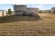 Large backyard with a deck, perfect for entertaining and outdoor activities at 5211 Benjamin Trl, Ellenwood, GA 30294
