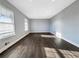 Spacious and bright living room with hardwood floors and natural light at 5211 Benjamin Trl, Ellenwood, GA 30294