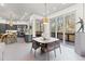 Open dining area with sliding glass doors to deck and kitchen views, perfect for entertaining at 8610 Sentinae Chase Dr, Roswell, GA 30076