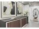 Hallway featuring modern art and a long decorative cabinet at 8610 Sentinae Chase Dr, Roswell, GA 30076