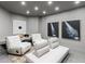 Modern living room with stylish decor, comfortable seating, and contemporary artwork at 8610 Sentinae Chase Dr, Roswell, GA 30076
