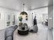 Living room with modern lighting and art at 8610 Sentinae Chase Dr, Roswell, GA 30076