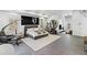 Spacious main bedroom with a seating area, large windows, and lots of natural light at 8610 Sentinae Chase Dr, Roswell, GA 30076