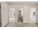 Hallway showcasing access to bedrooms and bathrooms at 13562 Whitman Ln, Covington, GA 30014