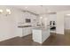 Modern kitchen featuring white cabinets, stainless steel appliances, and granite countertops at 13562 Whitman Ln, Covington, GA 30014