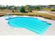 Community pool with lap lanes provides residents a place to swim and exercise outdoors at 13562 Whitman Ln, Covington, GA 30014