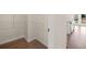 Walk-in closet with built-in shelving located near the kitchen at 13562 Whitman Ln, Covington, GA 30014