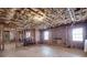 Unfinished basement featuring exposed brick, fireplace and framed walls at 24 Ball Creek Hl, Atlanta, GA 30350