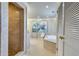 Featuring a shower and bath, this traditional bathroom has tile floors and neutral walls at 24 Ball Creek Hl, Atlanta, GA 30350