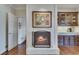Cozy brick fireplace sits next to a quaint bar area and access to other rooms at 24 Ball Creek Hl, Atlanta, GA 30350
