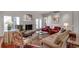Inviting living room with a fireplace, comfortable seating, and classic design elements at 24 Ball Creek Hl, Atlanta, GA 30350