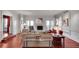 Spacious living room featuring a fireplace and access to an outdoor balcony at 24 Ball Creek Hl, Atlanta, GA 30350