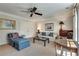 Inviting living room with sitting area and a ceiling fan at 24 Ball Creek Hl, Atlanta, GA 30350