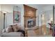 Bedroom features hardwood flooring, a fireplace, and natural light coming in from the doorway at 24 Ball Creek Hl, Atlanta, GA 30350