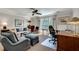 Well lit home office with a fan, seating, and desk at 24 Ball Creek Hl, Atlanta, GA 30350