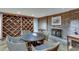 Stylish wine cellar with brick wall, fireplace, and ample storage at 24 Ball Creek Hl, Atlanta, GA 30350