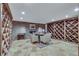 Spacious wine cellar featuring extensive storage and cozy seating area at 24 Ball Creek Hl, Atlanta, GA 30350
