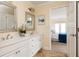 Elegant bathroom features double sinks, walk-in shower and bedroom view at 276 Atlanta Se Ave, Atlanta, GA 30315