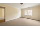 Neutral bedroom features plush carpeting, ample natural light, and a convenient doorway to other areas at 276 Atlanta Se Ave, Atlanta, GA 30315