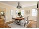 Bright dining room with natural light, stylish decor, and hardwood floors at 276 Atlanta Se Ave, Atlanta, GA 30315