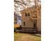 Exterior view of home featuring a deck, landscaping, and private yard at 276 Atlanta Se Ave, Atlanta, GA 30315