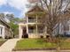 Charming two-story home featuring a double front porch, landscaped yard, and inviting curb appeal at 276 Atlanta Se Ave, Atlanta, GA 30315