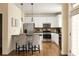 Charming kitchen with stainless steel appliances, granite countertops, and bar seating at 276 Atlanta Se Ave, Atlanta, GA 30315