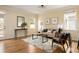Comfortable living room featuring hardwood floors, natural light, and cozy decor at 276 Atlanta Se Ave, Atlanta, GA 30315