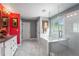 Bright bathroom with a glass shower, soaking tub, double sink vanity, and stylish marble floors at 308 Paper Woods Dr, Lawrenceville, GA 30046