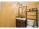 Compact bathroom featuring mosaic tile accents, modern fixtures, and a warm color scheme at 308 Paper Woods Dr, Lawrenceville, GA 30046