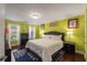 Cozy bedroom featuring hardwood floors and natural light at 308 Paper Woods Dr, Lawrenceville, GA 30046